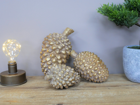 Set Of Three Golden Ornamental Pinecones