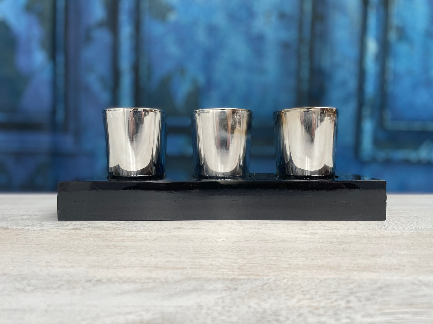 Three Silver Votive on Plinth